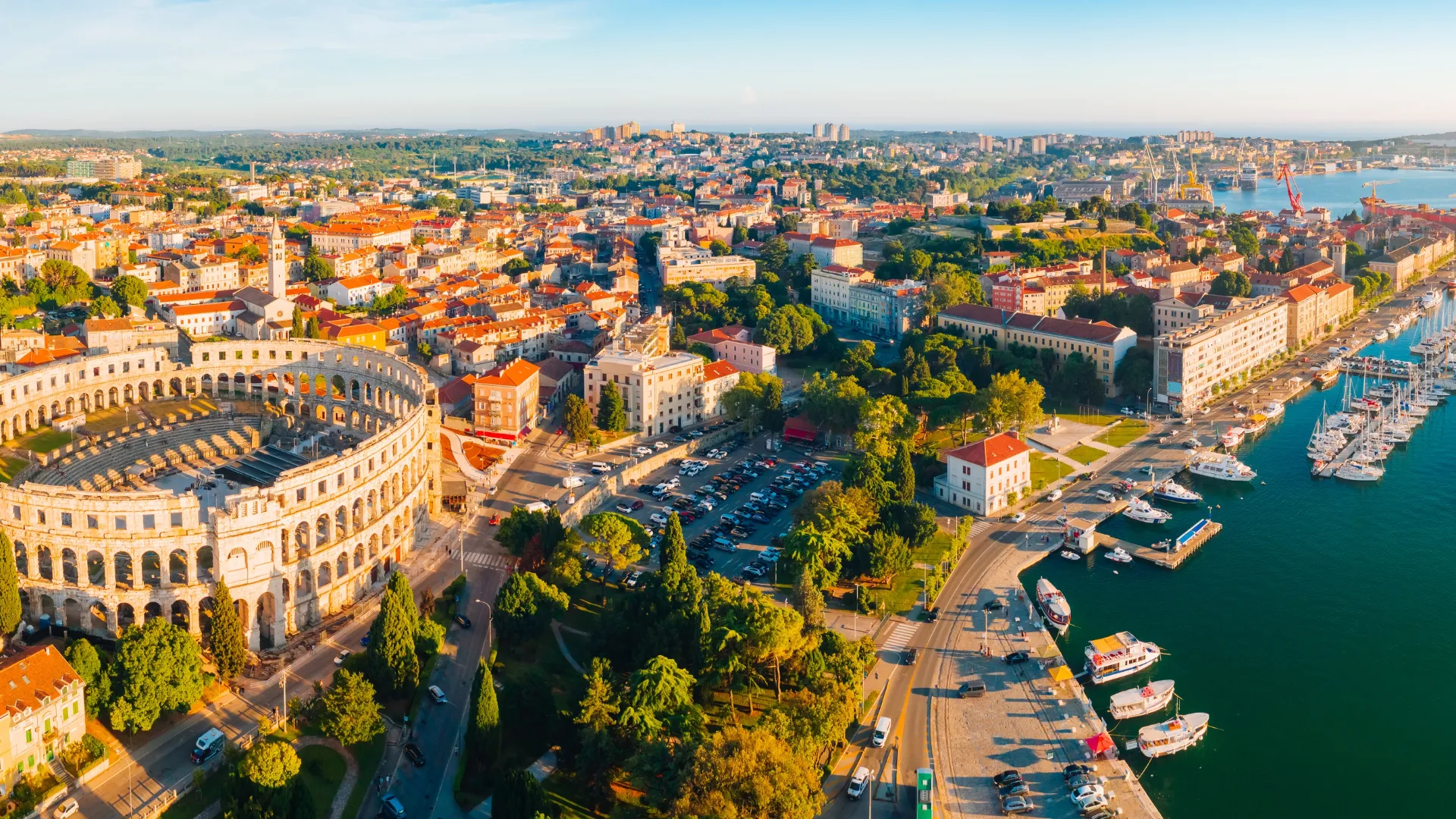 Pula Roman amphitheatre and harbour, the first stop on our small ship cruises Adriatic coast itinerary
